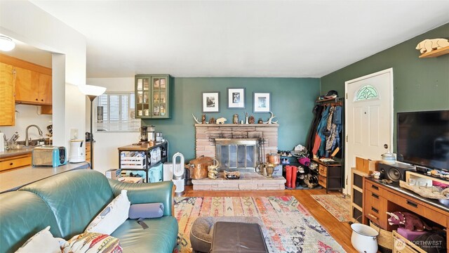 1001 1st Ave N, Seattle, WA 98109 - living area featuring wood finished floors and a fireplace