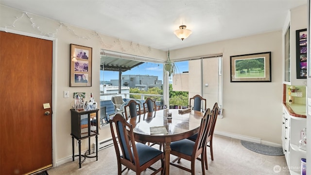 1001 1st Ave N, Seattle, WA 98109 - dining room featuring light carpet and rail lighting