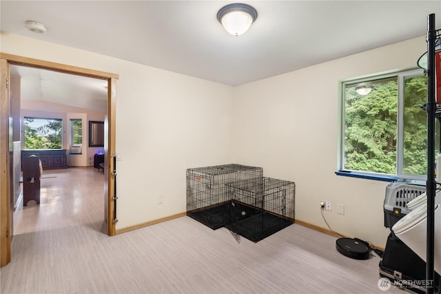 5818 Everson Goshen, Bellingham, WA 98226 - empty room with a smoke detector, wood finished floors, and lofted ceiling