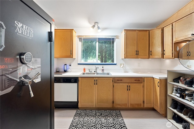 5818 Everson Goshen, Bellingham, WA 98226 - kitchen with stainless steel refrigerator, white dishwasher, light wood-style floors, and light countertops