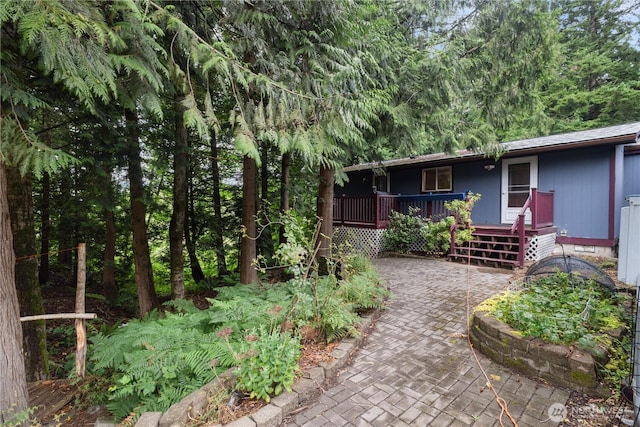 5818 Everson Goshen, Bellingham, WA 98226 - view of yard featuring a deck and a patio