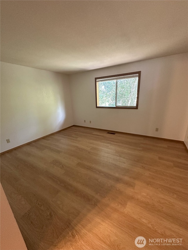 1430 Welling Rd, Bellingham, WA 98226 - spare room with light wood finished floors and baseboards