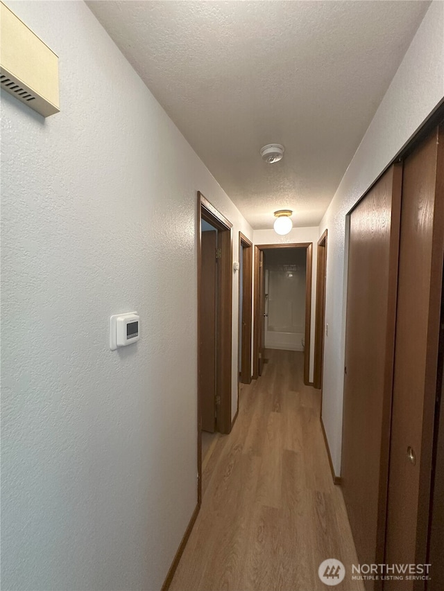 1430 Welling Rd, Bellingham, WA 98226 - corridor featuring light wood-type flooring and baseboards