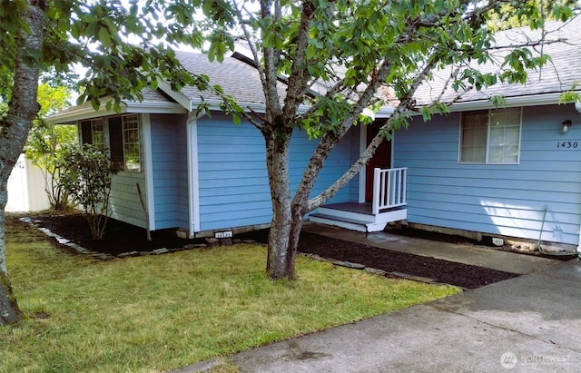 1430 Welling Rd, Bellingham, WA 98226 - view of front of house with a front yard and roof with shingles