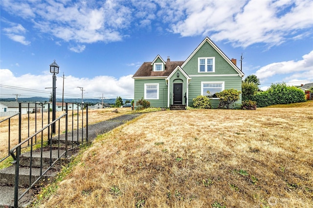 1008 W 5th St N, Port Angeles, WA 98363 - bungalow-style house featuring a chimney