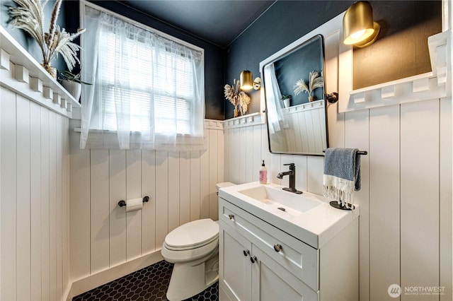 1008 W 5th St N, Port Angeles, WA 98363 - bathroom with vanity, wainscoting, and tile patterned floors