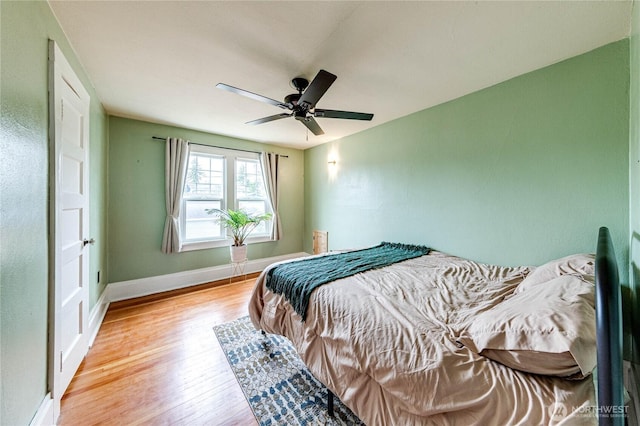 1008 W 5th St N, Port Angeles, WA 98363 - bedroom with light wood-style flooring and a ceiling fan