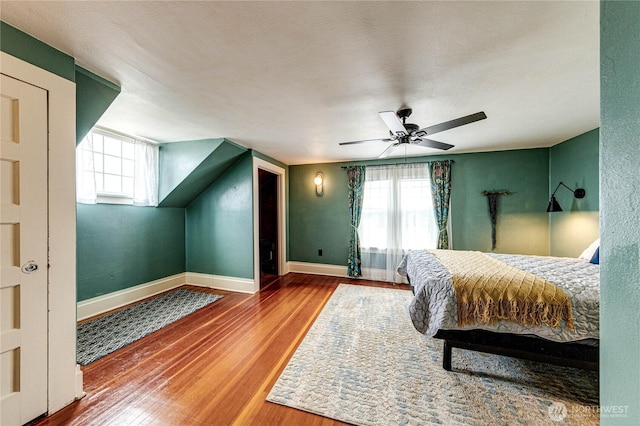 1008 W 5th St N, Port Angeles, WA 98363 - bedroom featuring multiple windows, wood finished floors, and ceiling fan