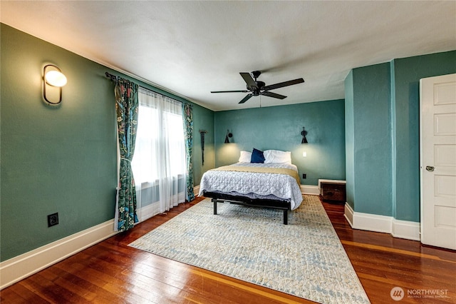 1008 W 5th St N, Port Angeles, WA 98363 - bedroom with dark wood-type flooring and ceiling fan