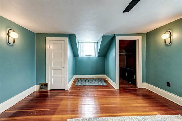 1008 W 5th St N, Port Angeles, WA 98363 - bonus room featuring wood finished floors and baseboards