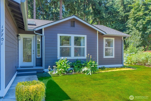 17701 Vine Ln SE, Yelm, WA 98597 - view of front of house featuring a front yard and roof with shingles
