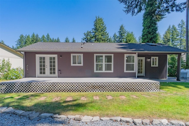 17701 Vine Ln SE, Yelm, WA 98597 - back of house with french doors and a lawn