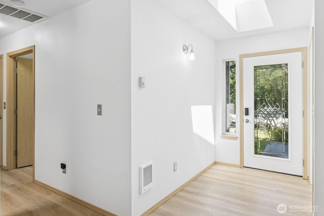 17701 Vine Ln SE, Yelm, WA 98597 - foyer featuring a skylight and light wood-style flooring