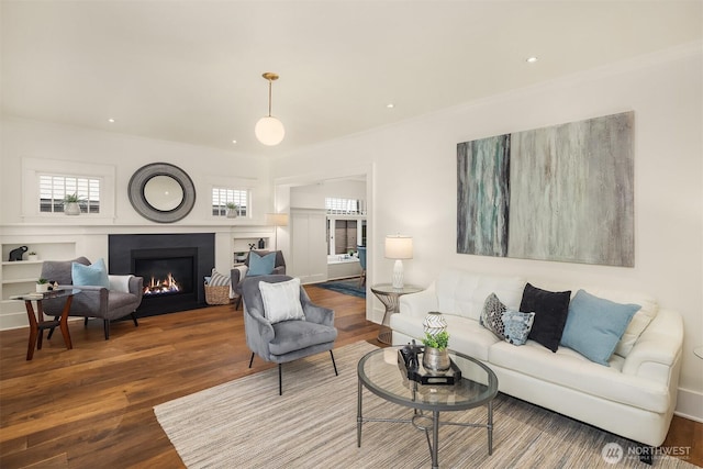 5526 34th Ave NE, Seattle, WA 98105 - living room with a fireplace with flush hearth, wood finished floors, and recessed lighting