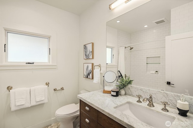 5526 34th Ave NE, Seattle, WA 98105 - full bathroom with vanity, a tile shower, and recessed lighting