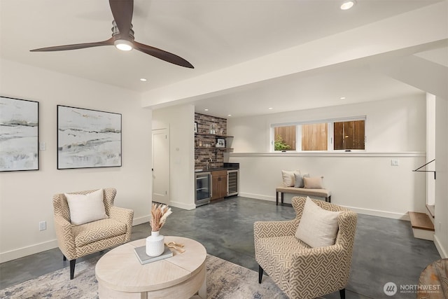 5526 34th Ave NE, Seattle, WA 98105 - living area with wine cooler, concrete floors, recessed lighting, and a ceiling fan