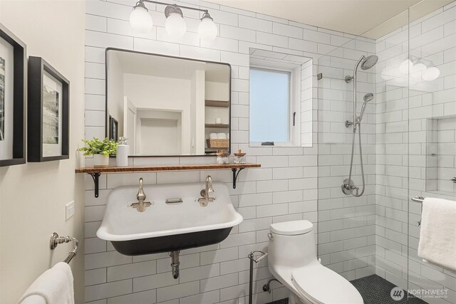 5526 34th Ave NE, Seattle, WA 98105 - bathroom with a stall shower and tile walls