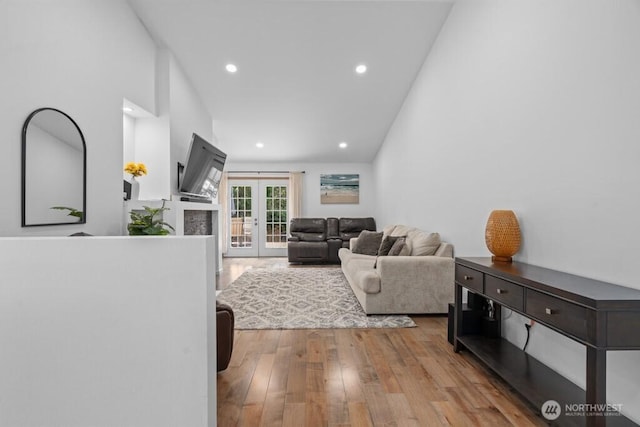37509 21st Ave S, Federal Way, WA 98003 - living area with wood finished floors, french doors, and recessed lighting