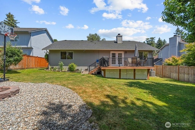 37509 21st Ave S, Federal Way, WA 98003 - rear view of property featuring a deck, a fenced backyard, stairs, and a chimney