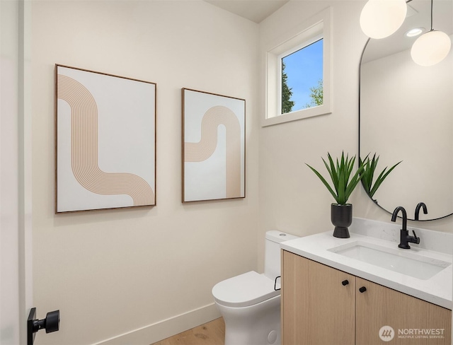 819 18th Ave W, Kirkland, WA 98033 - half bath featuring vanity and wood finished floors