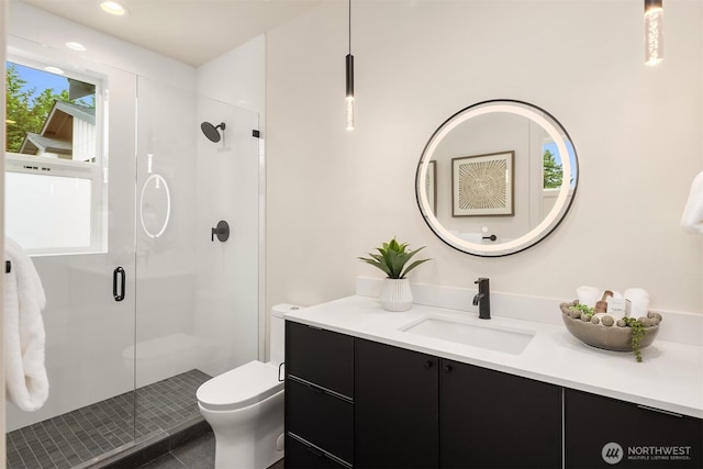 819 18th Ave W, Kirkland, WA 98033 - bathroom featuring vanity, a shower stall, tile patterned flooring, and recessed lighting