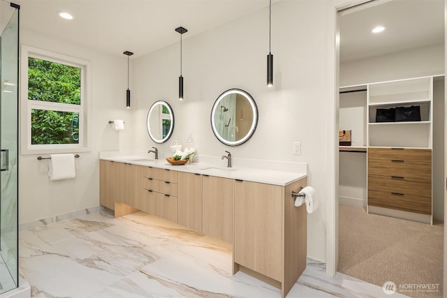 819 18th Ave W, Kirkland, WA 98033 - full bath with double vanity, a marble finish shower, marble finish floors, and recessed lighting