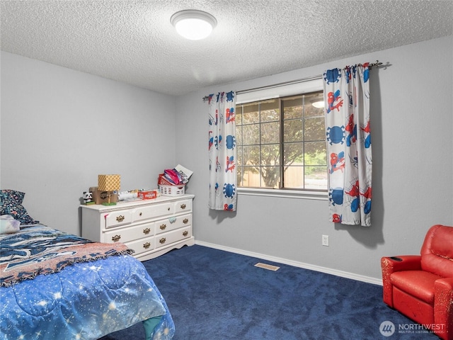 6908 254th St E, Graham, WA 98338 - bedroom featuring carpet floors and a textured ceiling