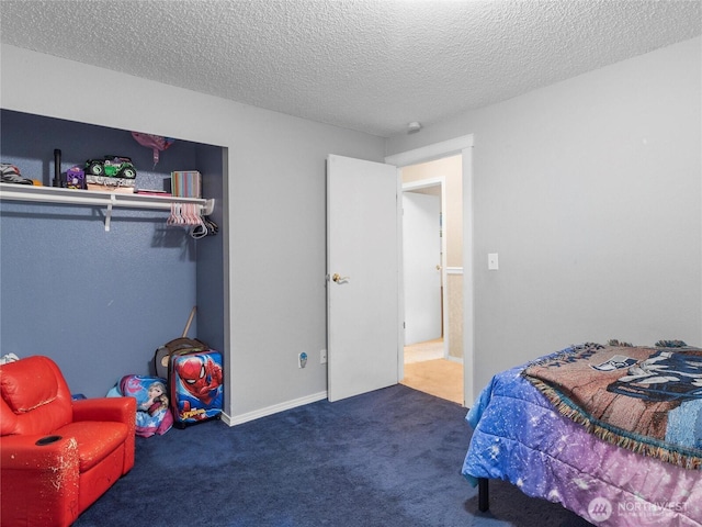 6908 254th St E, Graham, WA 98338 - carpeted bedroom with a textured ceiling