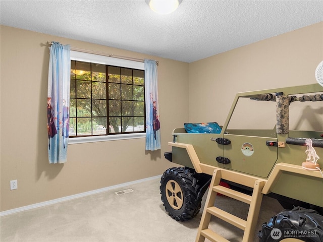 6908 254th St E, Graham, WA 98338 - carpeted bedroom with a textured ceiling