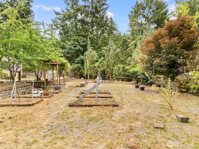 6908 254th St E, Graham, WA 98338 - view of yard featuring a garden
