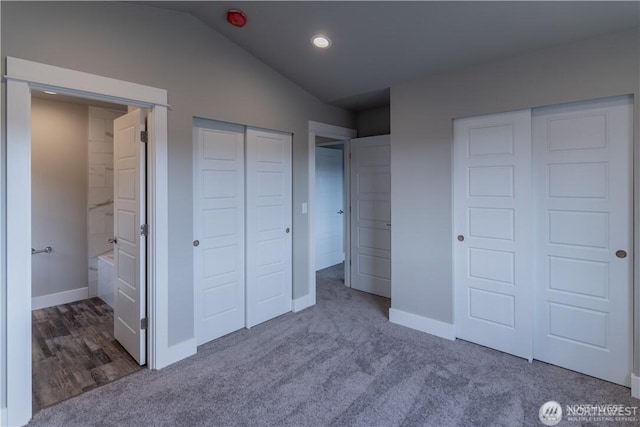 18911 Eagle Ridge Dr E Unit Lt527, Bonney Lake, WA 98391 - unfurnished bedroom with multiple closets, carpet, lofted ceiling, and ensuite bathroom