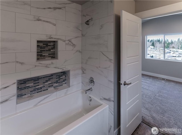 18911 Eagle Ridge Dr E Unit Lt527, Bonney Lake, WA 98391 - bathroom featuring  shower combination and baseboards