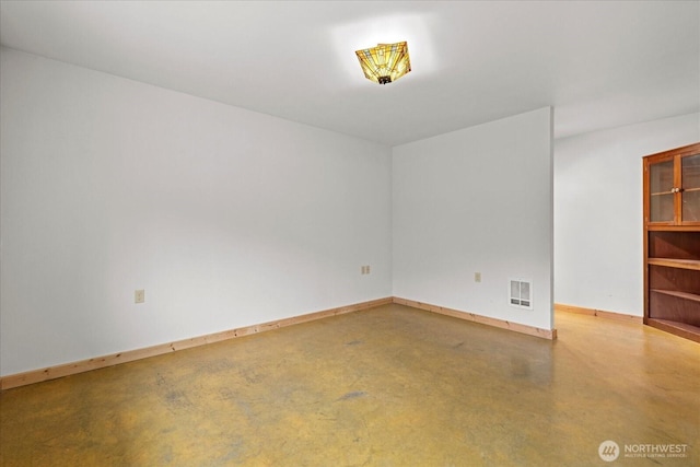 7609 Pressentin Ct, Concrete, WA 98237 - spare room with concrete floors and baseboards