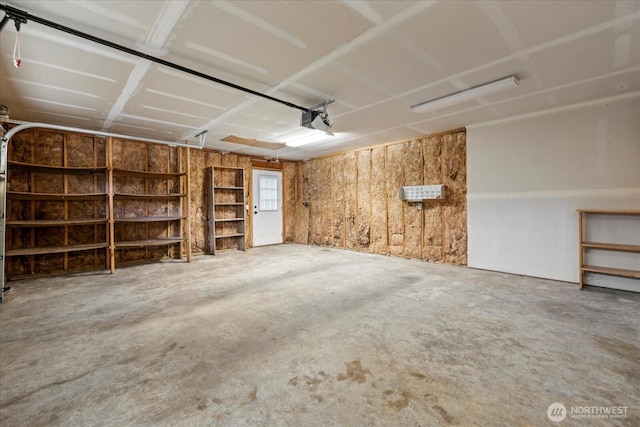 7609 Pressentin Ct, Concrete, WA 98237 - garage featuring a garage door opener
