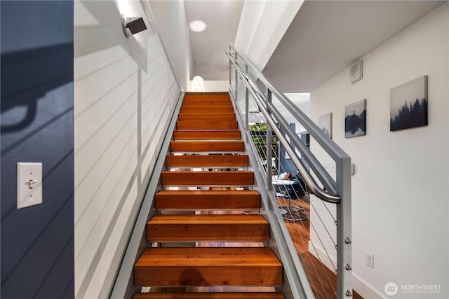 2911 2nd Ave Unit 120, Seattle, WA 98121 - staircase featuring wood finished floors