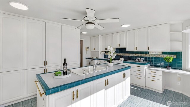 1517 126th Ave E, Edgewood, WA 98372 - kitchen with white cabinetry, open shelves, ceiling fan, light tile patterned flooring, and tasteful backsplash