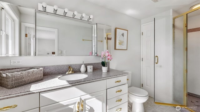 1517 126th Ave E, Edgewood, WA 98372 - bathroom featuring vanity, a stall shower, and tile patterned floors