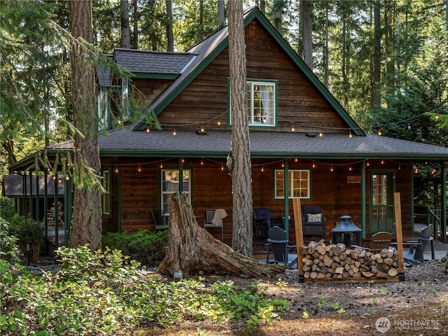 10723 105th Street Ct, Anderson Island, WA 98303 - back of house with a shingled roof