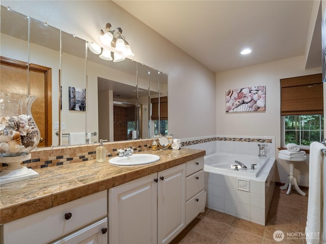 10723 105th Street Ct, Anderson Island, WA 98303 - full bath featuring vanity, tile patterned floors, a garden tub, a shower stall, and a chandelier