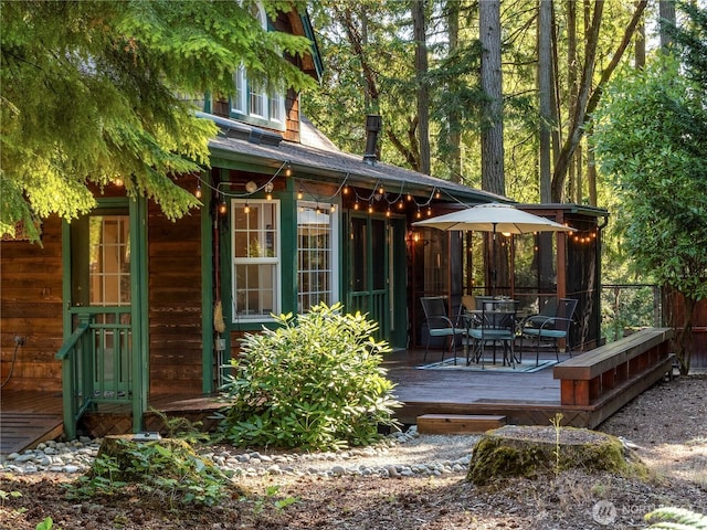 10723 105th Street Ct, Anderson Island, WA 98303 - wooden deck with outdoor dining area