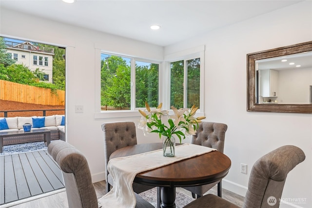 4130 Palatine Ave N, Seattle, WA 98103 - dining room with wood finished floors and recessed lighting