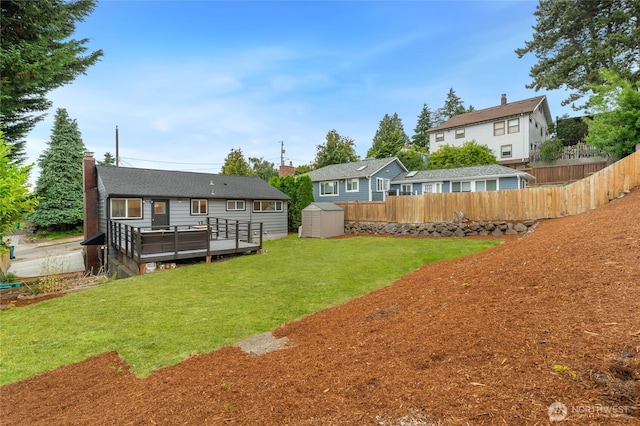 4130 Palatine Ave N, Seattle, WA 98103 - view of yard with a storage unit and a wooden deck