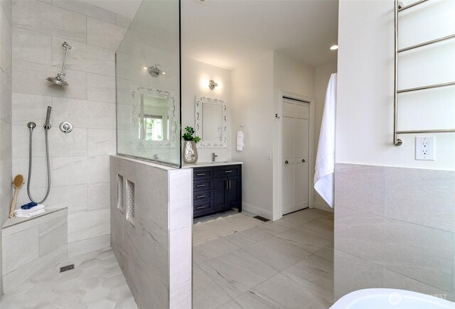 29851 12th Ave SW, Federal Way, WA 98023 - bathroom with vanity, a walk in shower, and a soaking tub