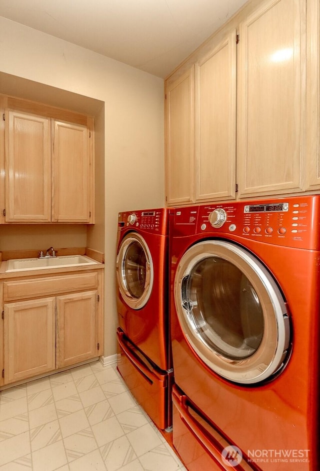 29851 12th Ave SW, Federal Way, WA 98023 - laundry room featuring washer and clothes dryer, cabinet space, and light marble finish floors