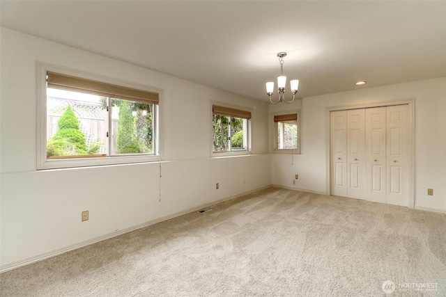 29851 12th Ave SW, Federal Way, WA 98023 - unfurnished bedroom featuring a chandelier, carpet, recessed lighting, and a closet