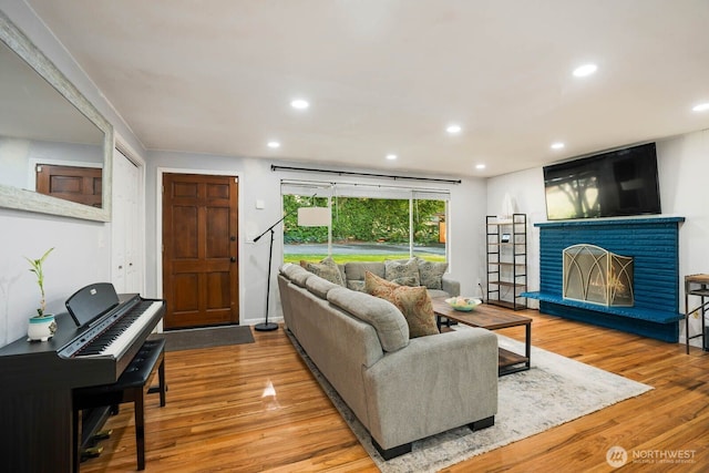 2536 S 286th St, Federal Way, WA 98003 - living area featuring wood finished floors, recessed lighting, and a brick fireplace