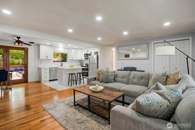 2536 S 286th St, Federal Way, WA 98003 - living room featuring light wood finished floors, a ceiling fan, and recessed lighting
