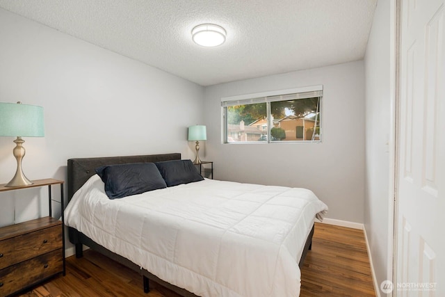 2536 S 286th St, Federal Way, WA 98003 - bedroom with wood finished floors and a textured ceiling