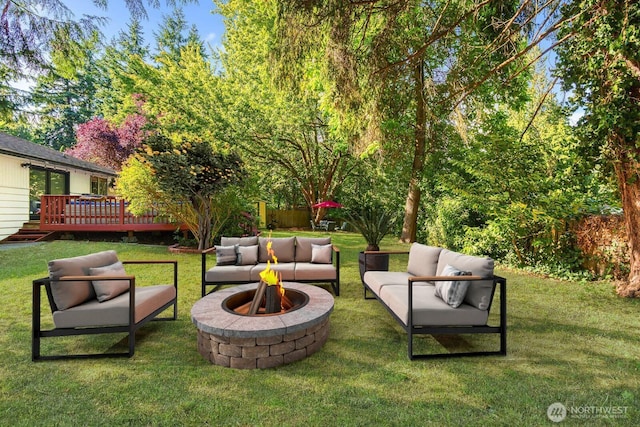 2536 S 286th St, Federal Way, WA 98003 - view of green lawn with an outdoor living space with a fire pit and a deck