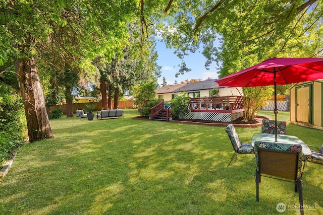 2536 S 286th St, Federal Way, WA 98003 - fenced backyard featuring a storage unit, a deck, and outdoor lounge area